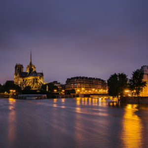 The swollen Seine river runs through Paris next to Notre Dame