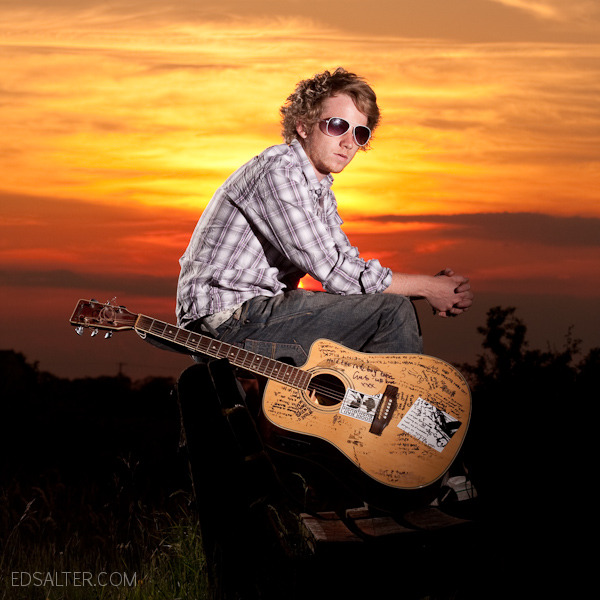 Ant with guitar at sunset