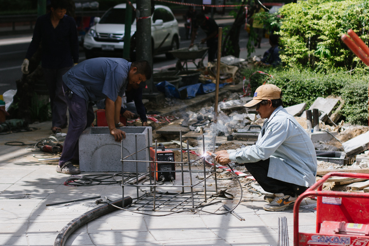 Street worker welding